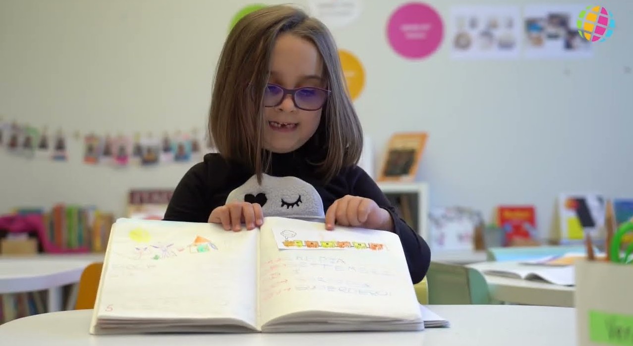 A kindergarten class at work, the opening frame of the film