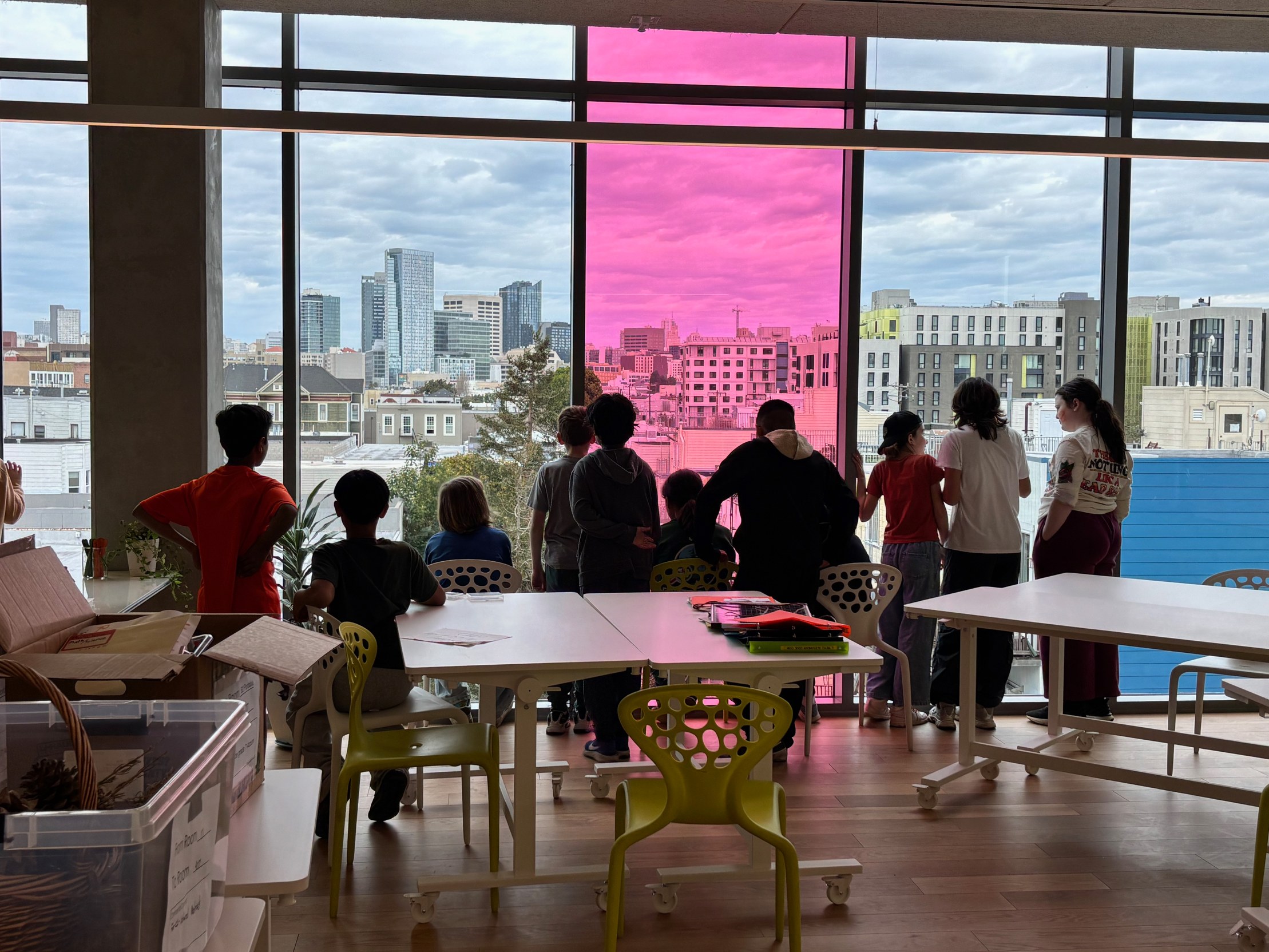 Students at work in a bright classroom